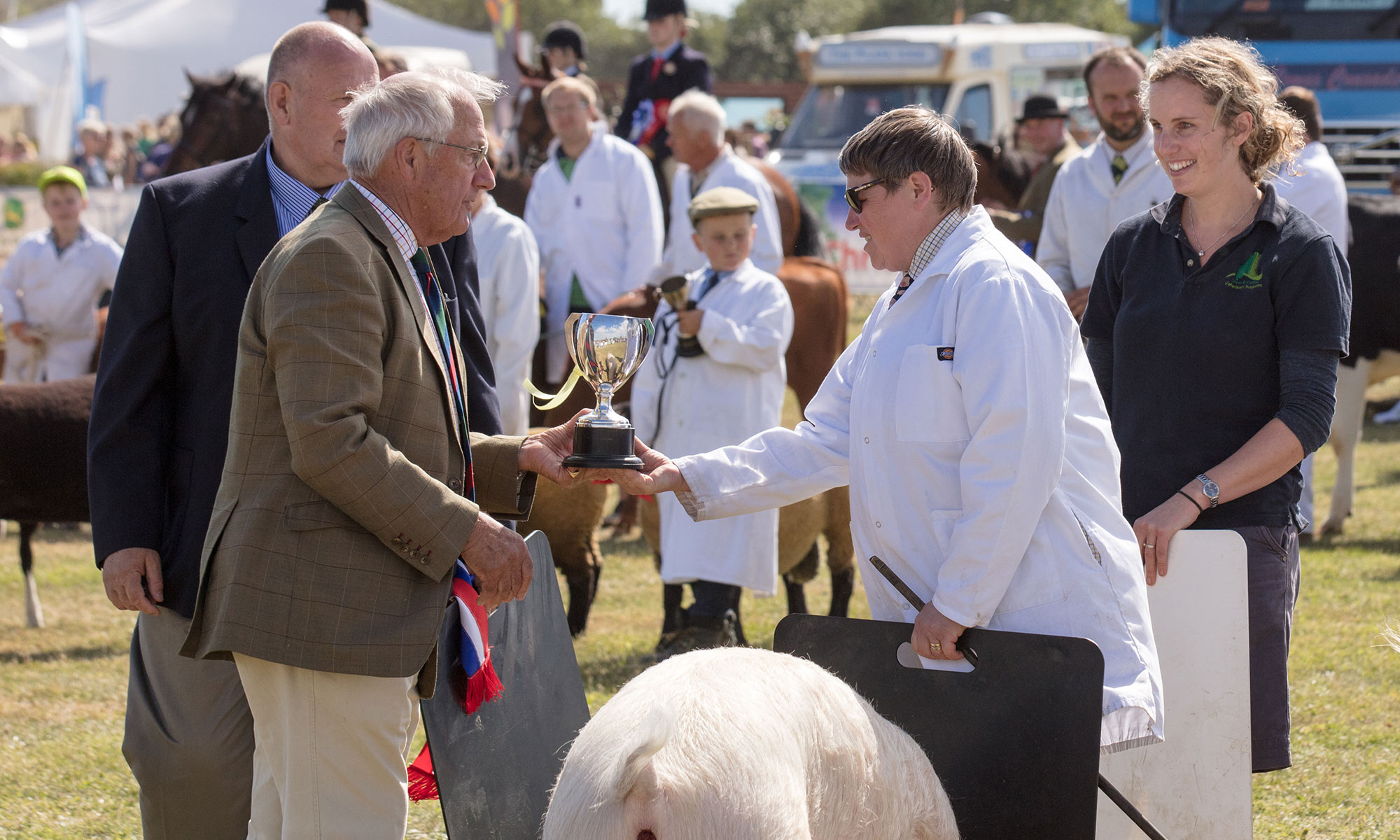 Farmer receiving trophy