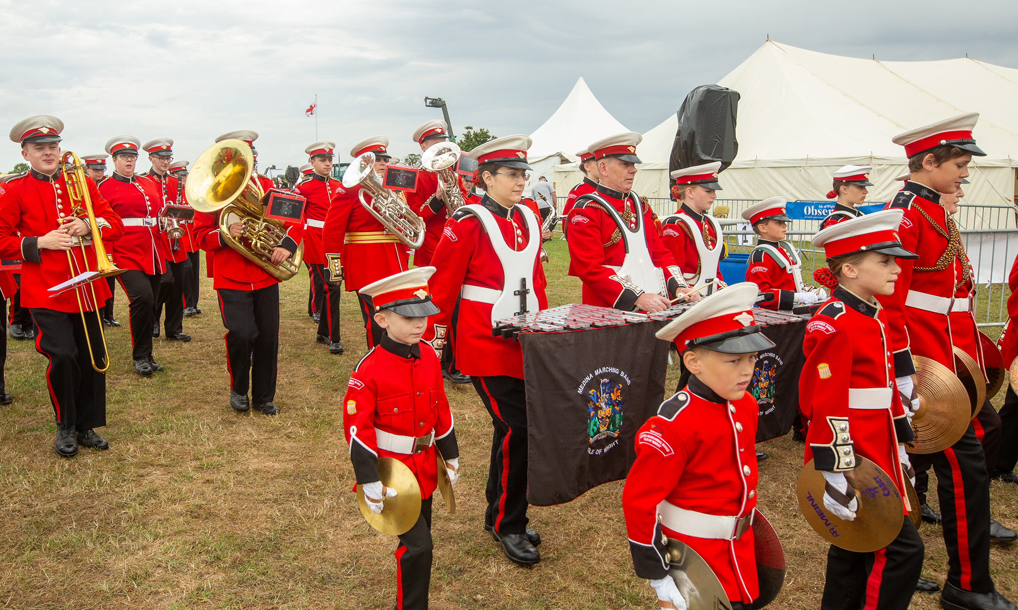 marching band dressed in red uniform